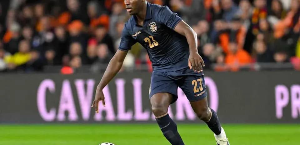 Player dribbling the ball during a football match