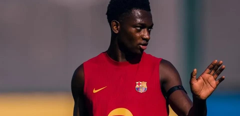 Player in red jersey during training session