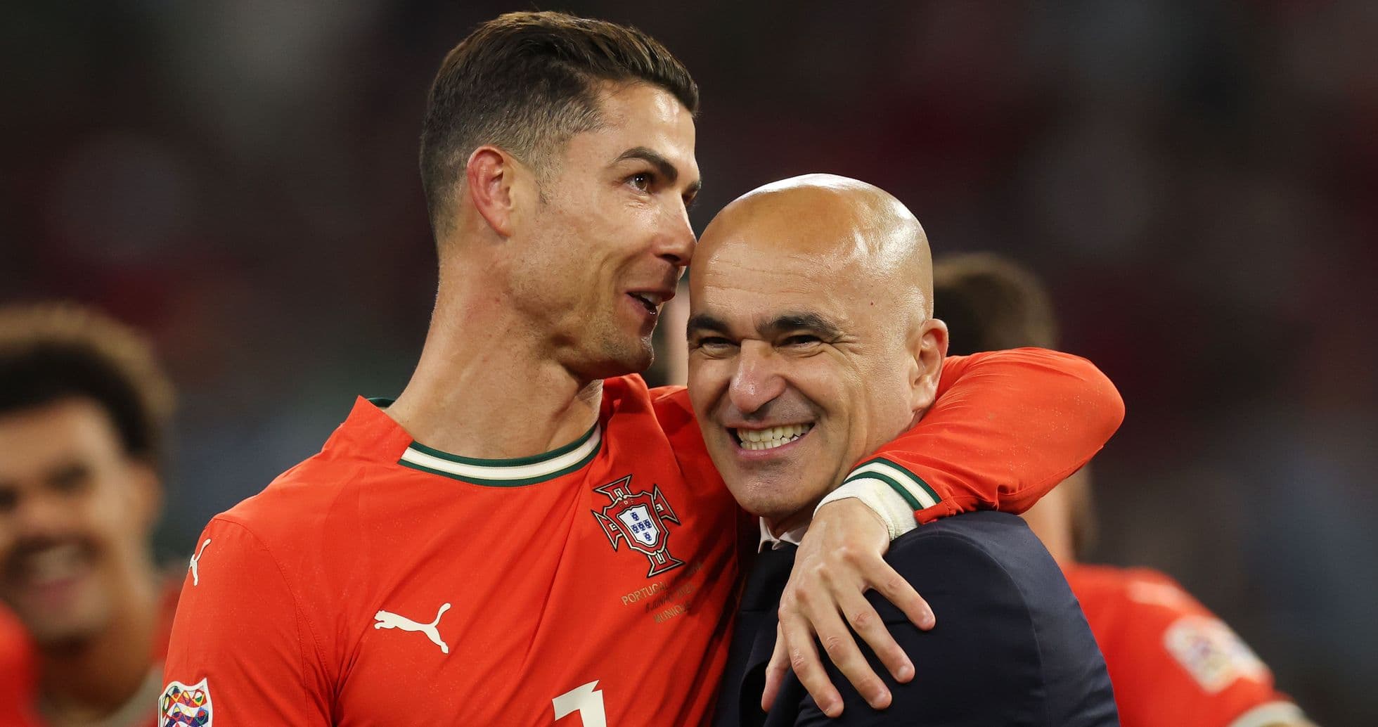 Cristiano Ronaldo embracing coach after match victory