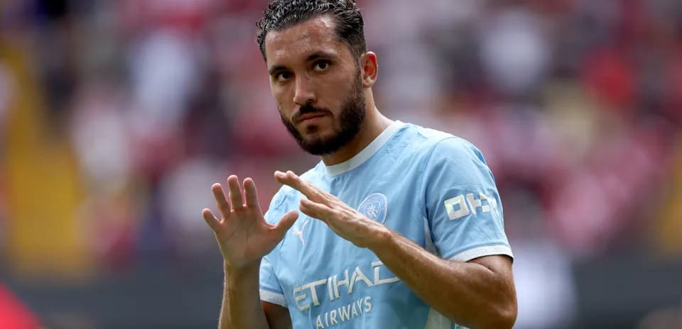 Player gesturing during match warm-up on field