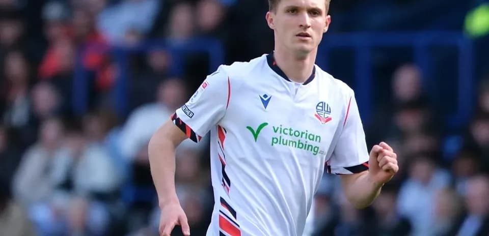 Player in Bolton Wanderers kit during match