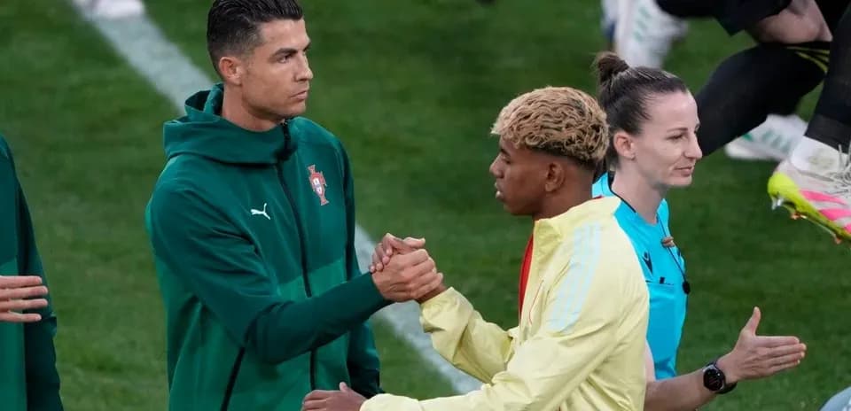 Two players shaking hands before the match