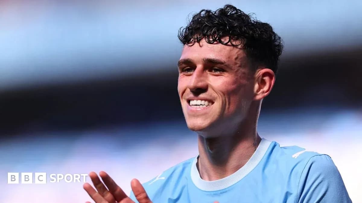 Player smiling and applauding after match