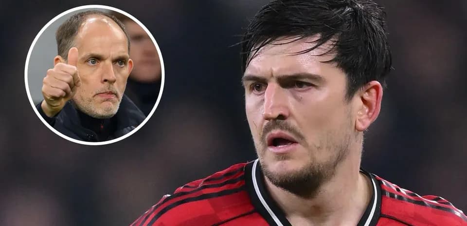 Harry Maguire in red jersey during match action