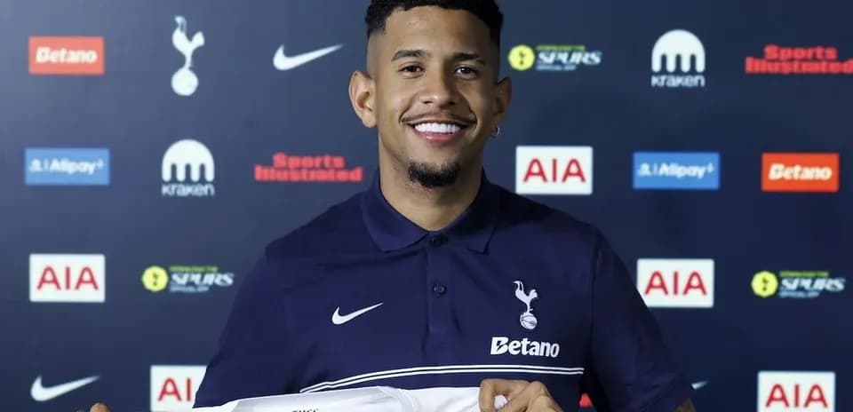 Player holding Tottenham Hotspur shirt at announcement