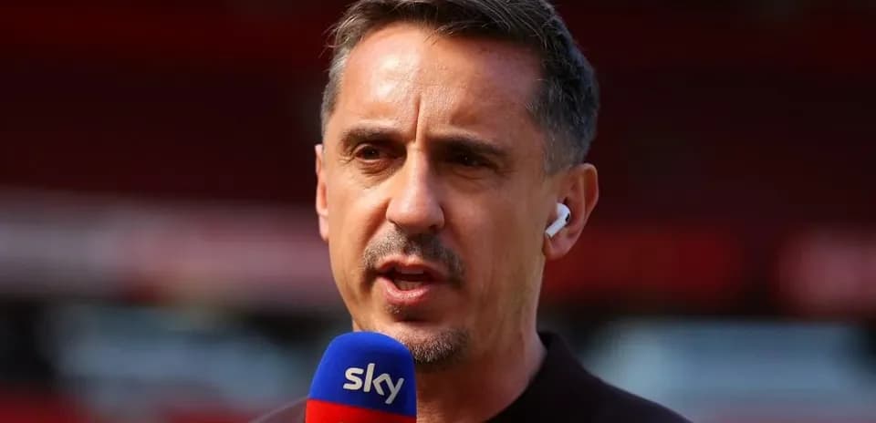 Sportscaster speaking into microphone at venue