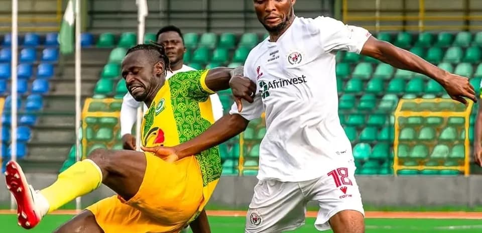 Player tackling opponent during NPFL match