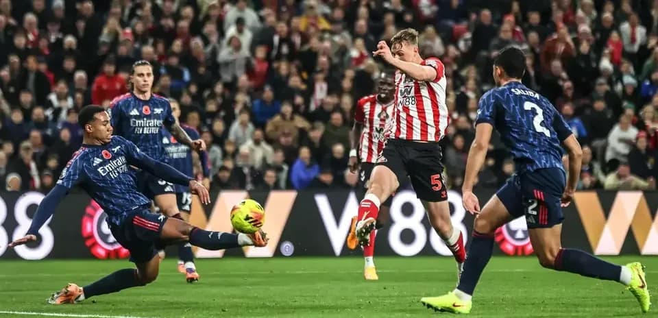 Sunderland player shooting during match against Arsenal