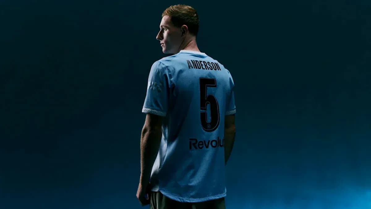 Player wearing light blue jersey with number 5