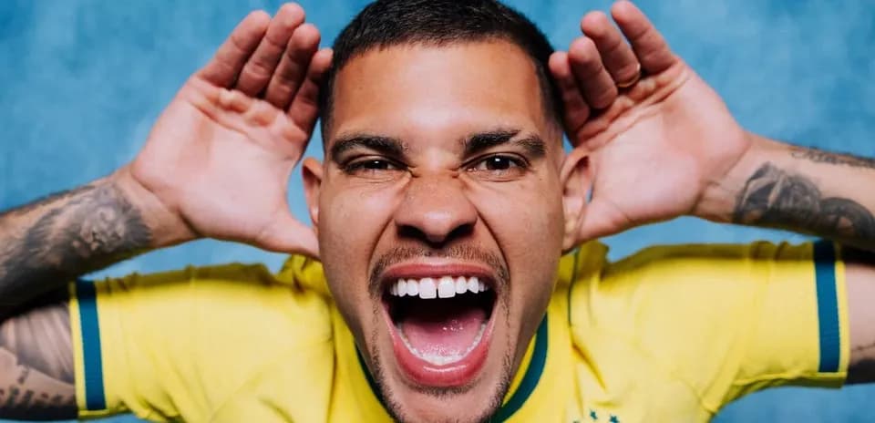 Player in Brazil jersey making a loud gesture