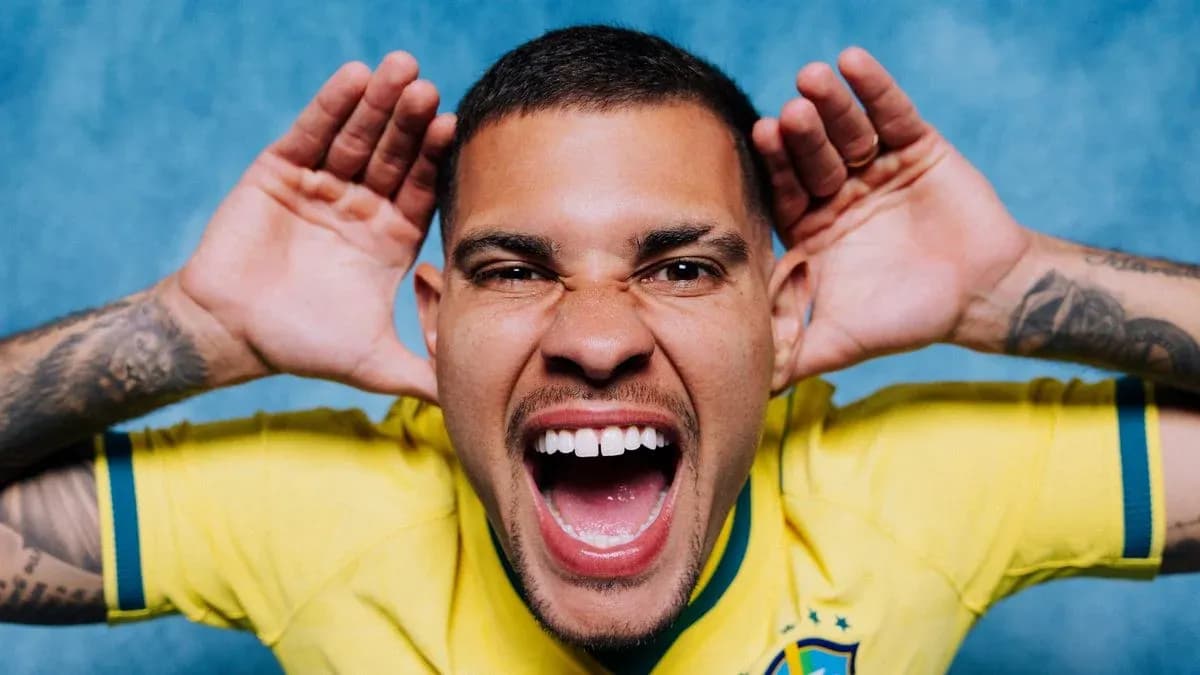 Player in Brazil jersey making a loud gesture