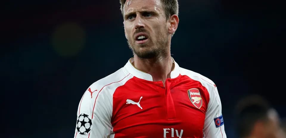 Player wearing Arsenal jersey during a match