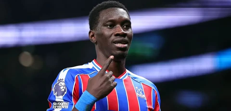 Player celebrating and pointing during match action