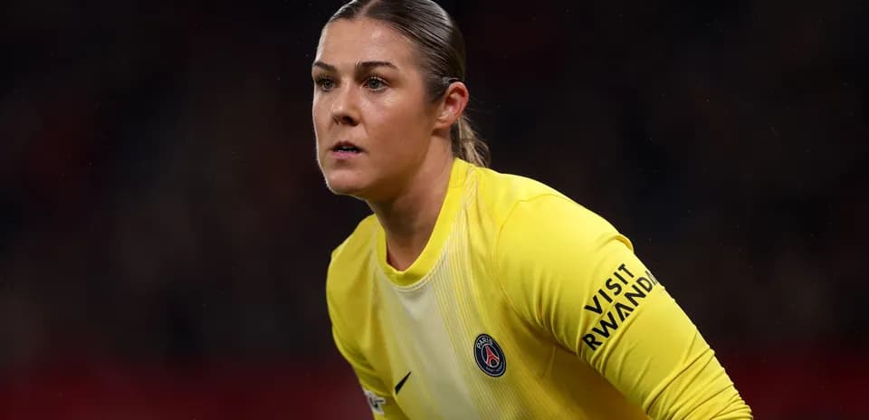 Goalkeeper in yellow kit preparing for play
