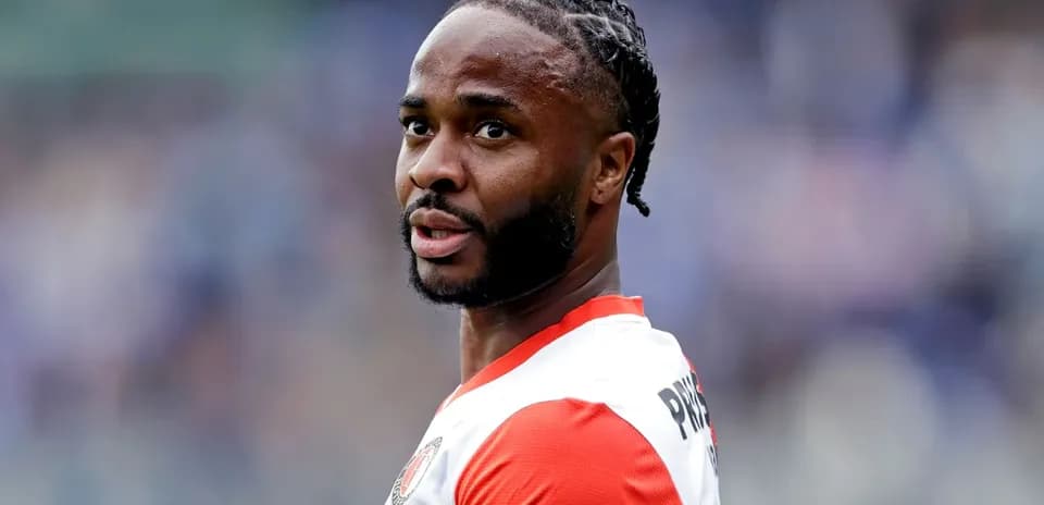 Player in team jersey looking during match