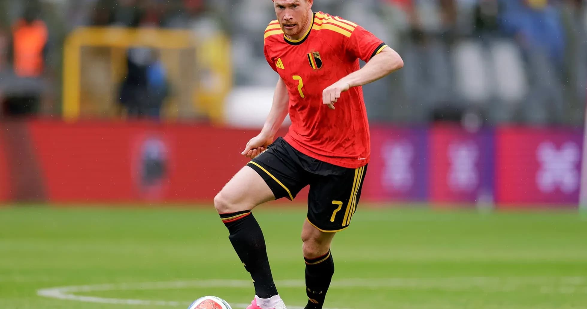 Belgian player dribbling during match