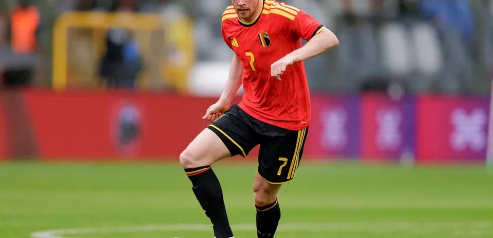 Belgian player dribbling during match
