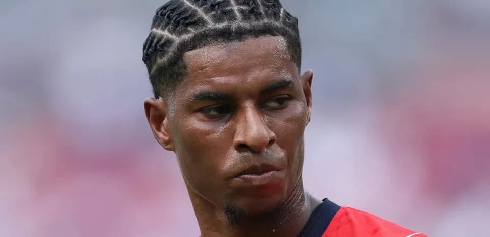 Player with braided hairstyle during match