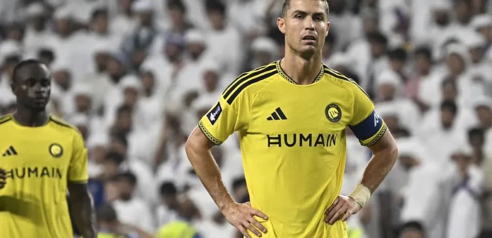 Cristiano Ronaldo wearing yellow kit during match