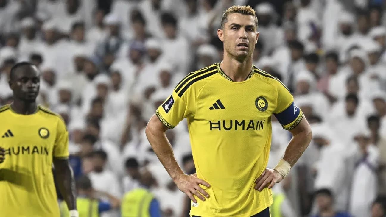 Cristiano Ronaldo wearing yellow kit during match