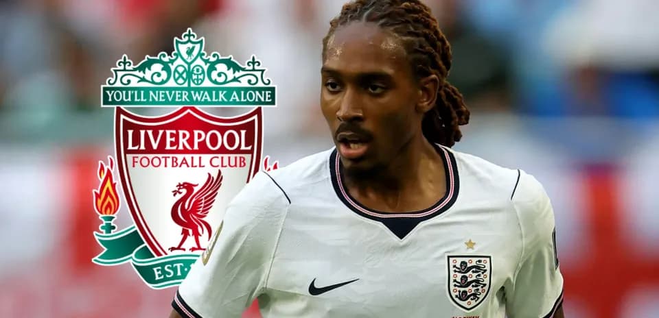 Player running on the field with Liverpool logo background