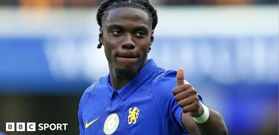Player giving thumbs up during match celebration