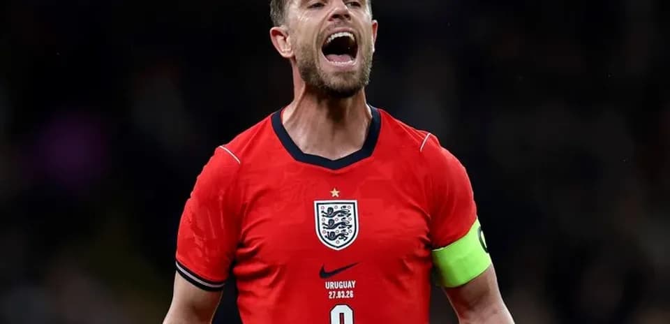 Player celebrating in England kit during match