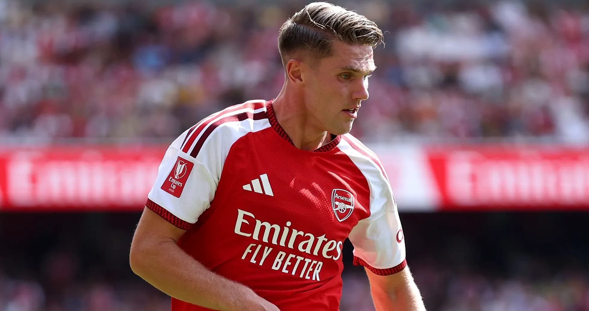 Player in Arsenal kit during match action