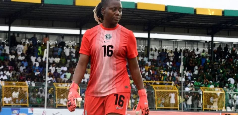 Goalkeeper walking on the field during match