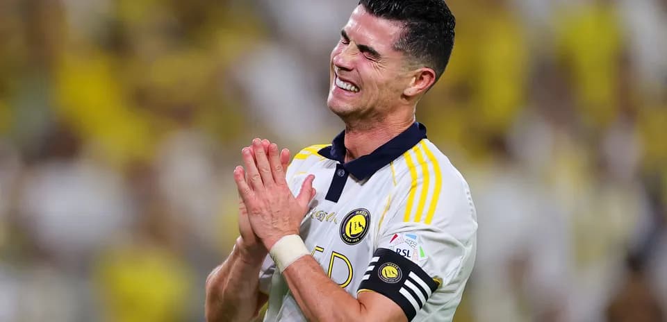 Player celebrating during match with clasped hands