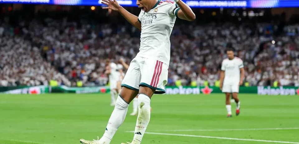 Player celebrating after scoring a goal during match