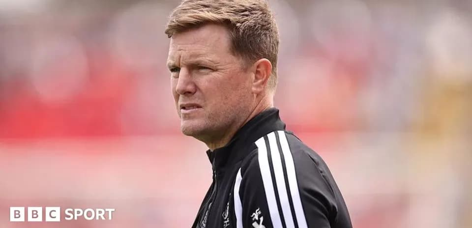 Coach observing the match from the sidelines