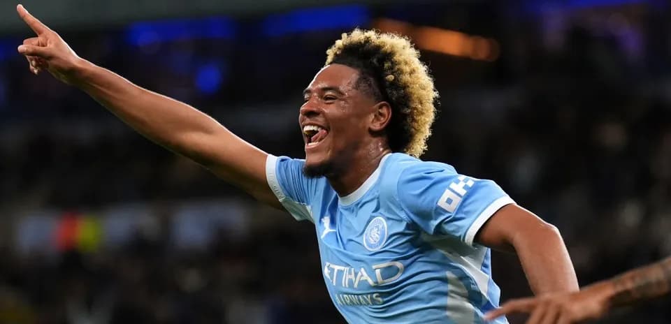 Player celebrating a goal with outstretched arm