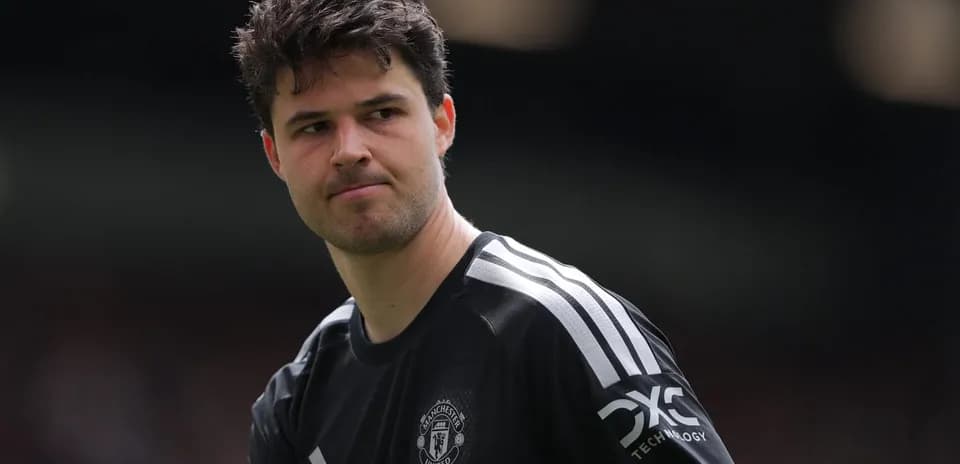 Goalkeeper in Manchester United kit on the field