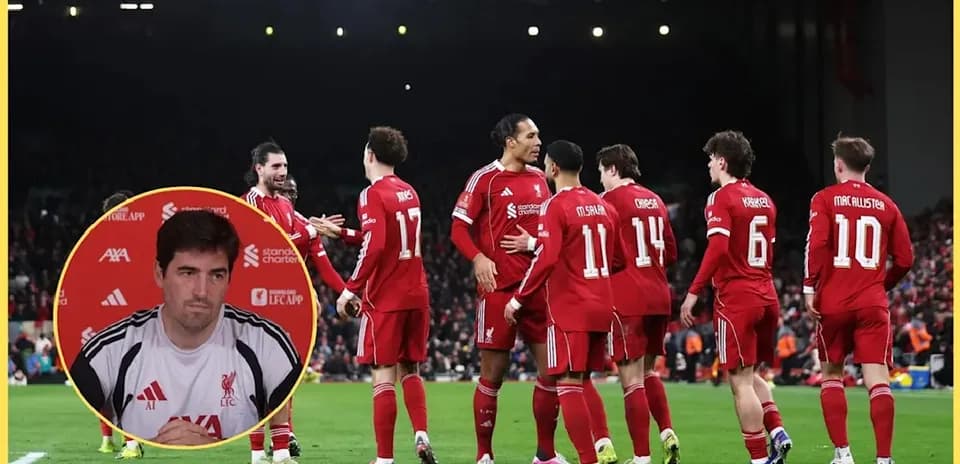 Liverpool players celebrating on the pitch together