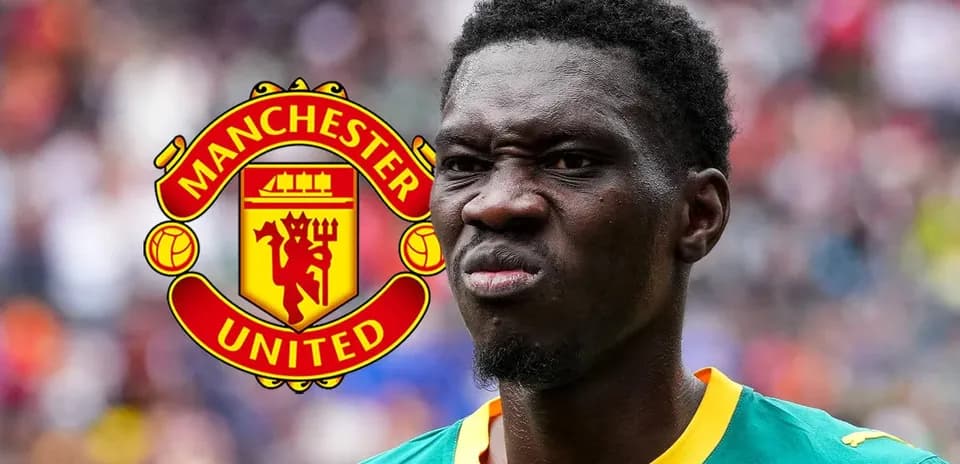 Player in green jersey with Manchester United logo