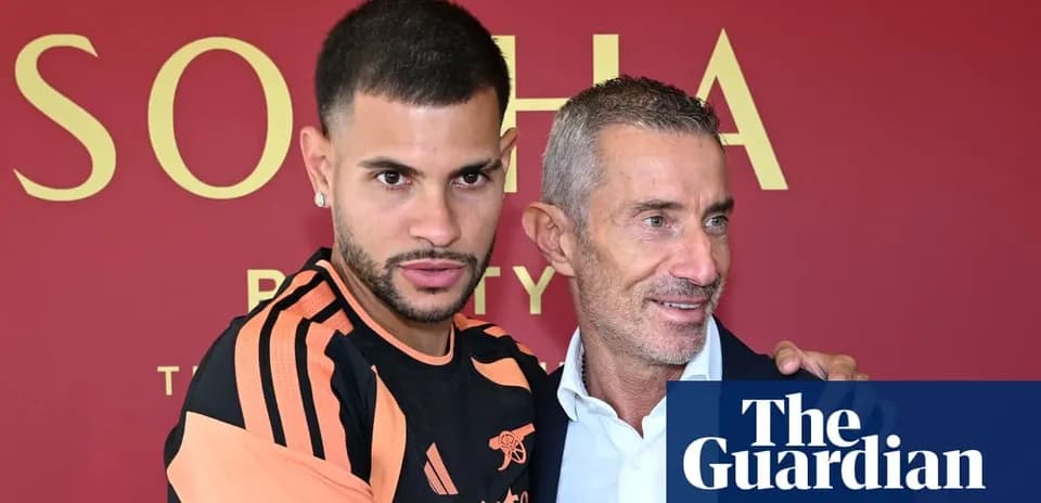 Player and manager posing at press conference event