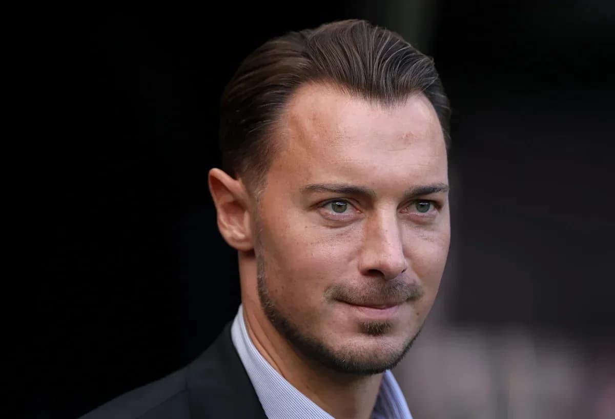 Man in a suit looking at the camera