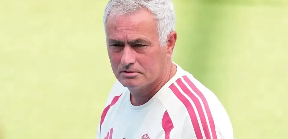 Coach in Real Madrid training kit during session
