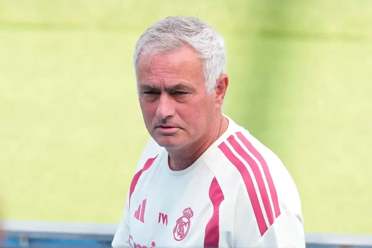 Coach in Real Madrid training kit during session