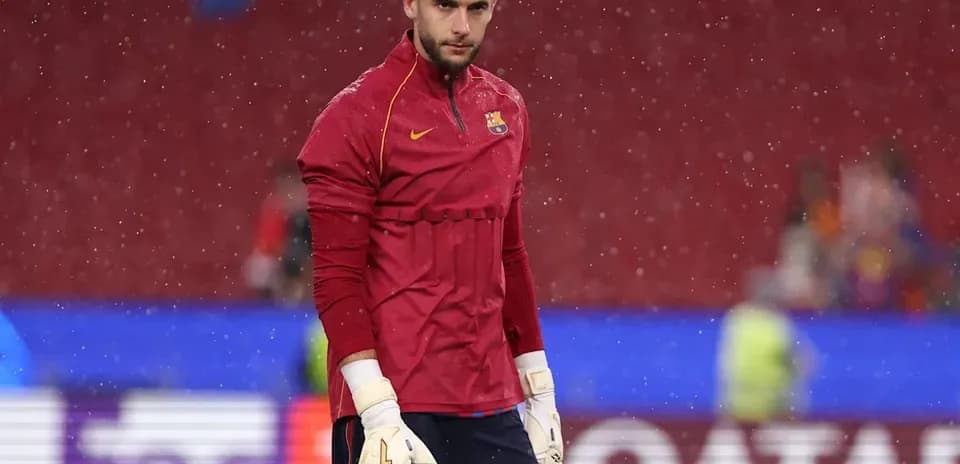 Goalkeeper training in rain before match