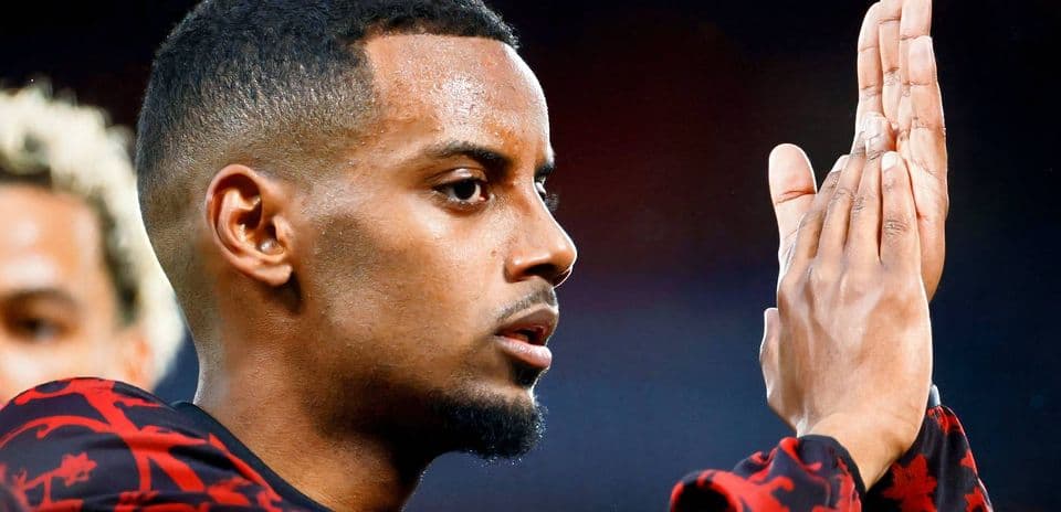Player applauding fans after a match