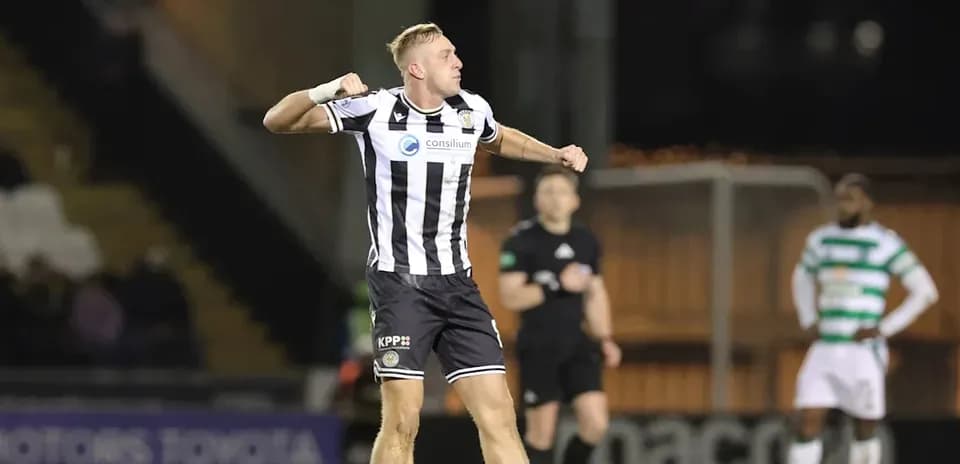 Player celebrating a goal during a football match