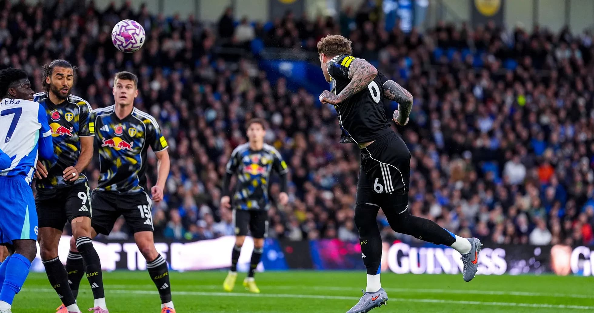 Leeds goalkeeper defending against Brighton attack