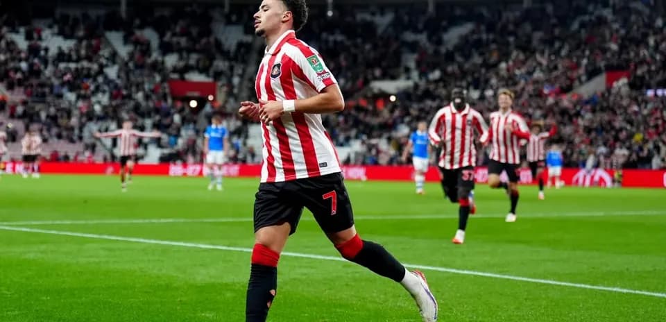 Player celebrating after scoring a goal during match