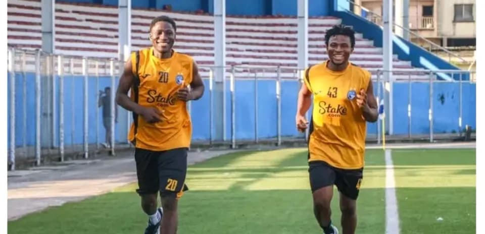 Players jogging during Enyimba training session
