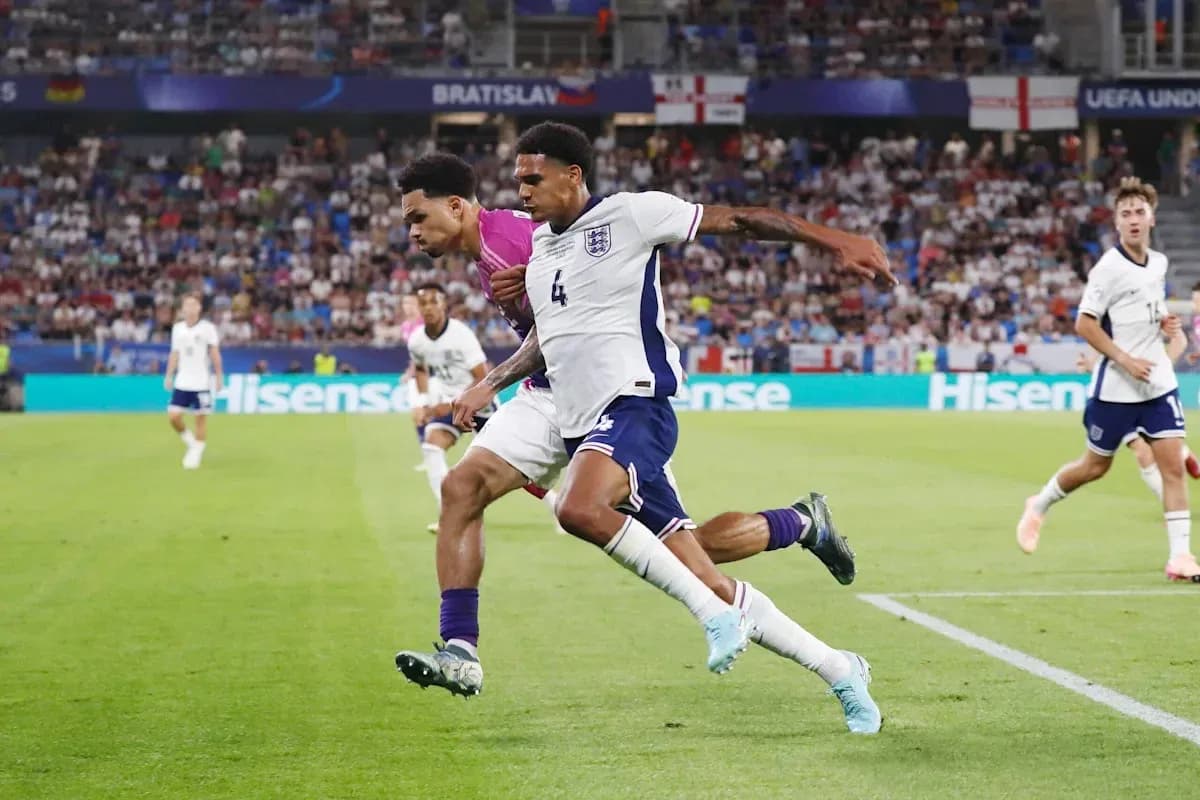 Players competing for the ball during match action