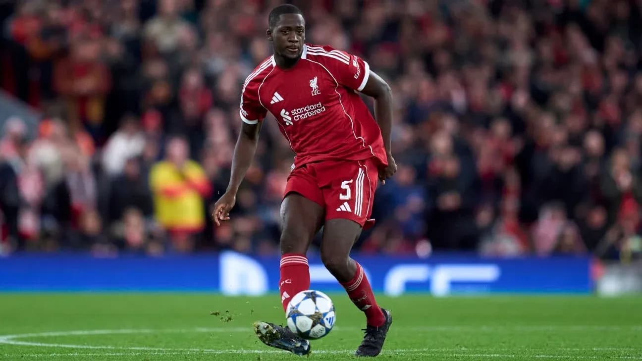 Liverpool player dribbling the ball during match