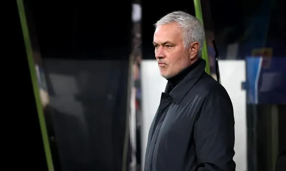 Manager observing from the sidelines during match