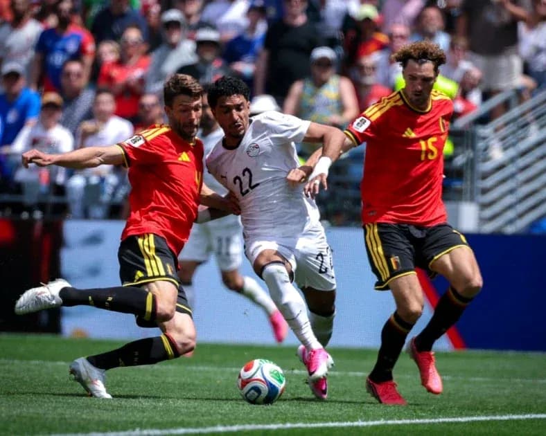 Players contesting for the ball during match